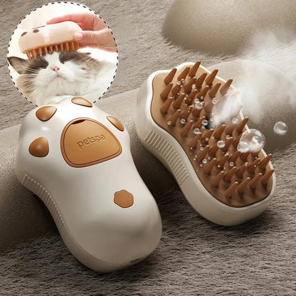 Pet grooming brush with paw design on a textured surface, inset showing use on a cat.