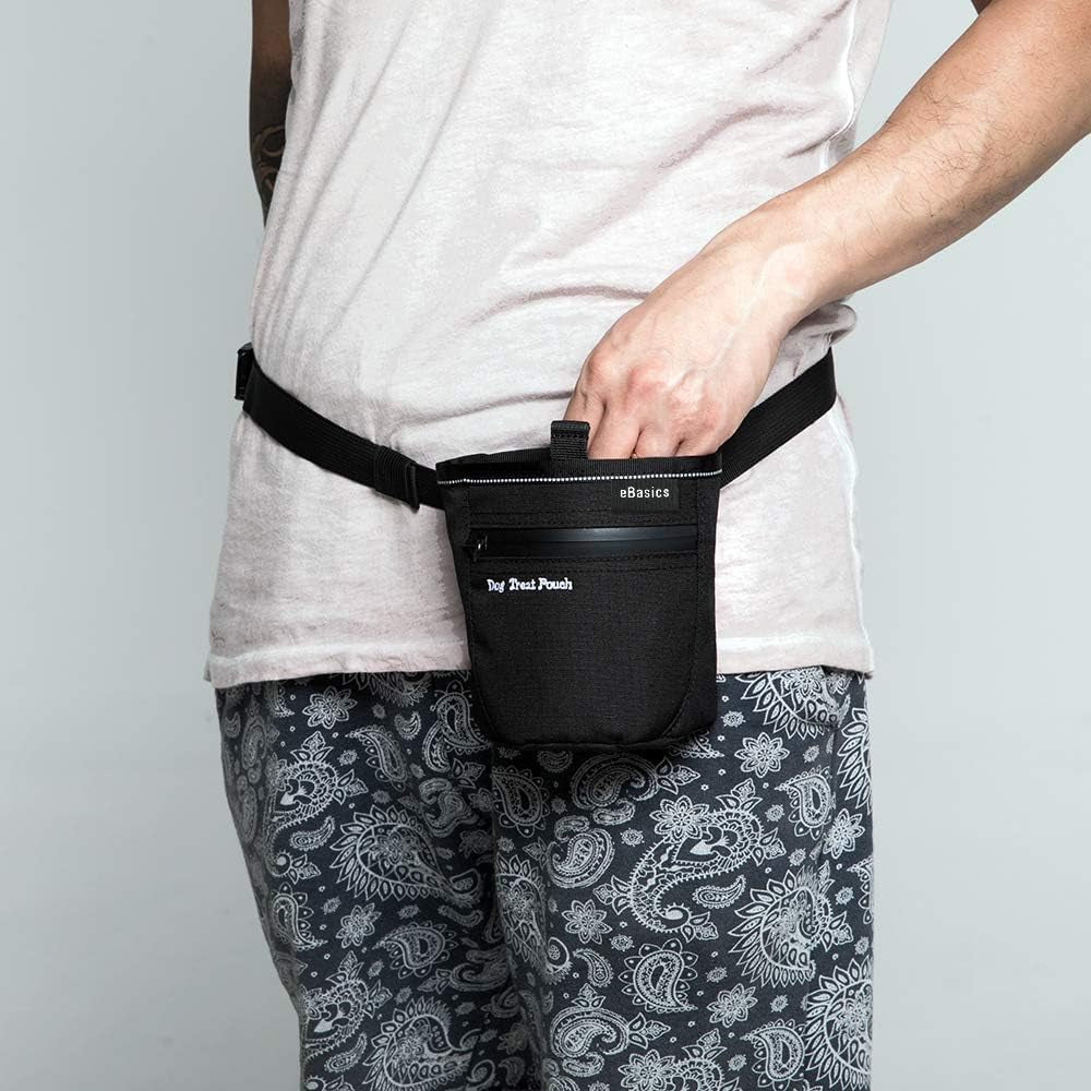 Person wearing a black waist bag with 'The Great Pumpkin' branding on a plain background