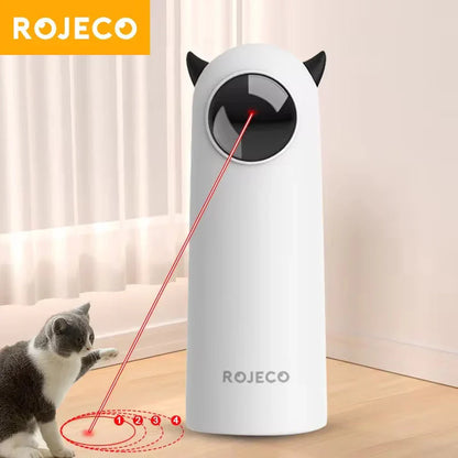 White cat-shaped toy with red laser beam and ROJECO branding on a light background.