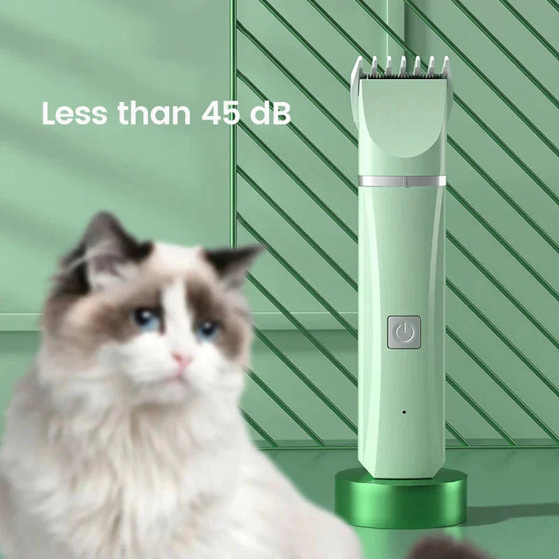 Green pet grooming clipper with a cat in front of a green background