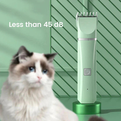 Green pet grooming clipper with a cat in front of a green background